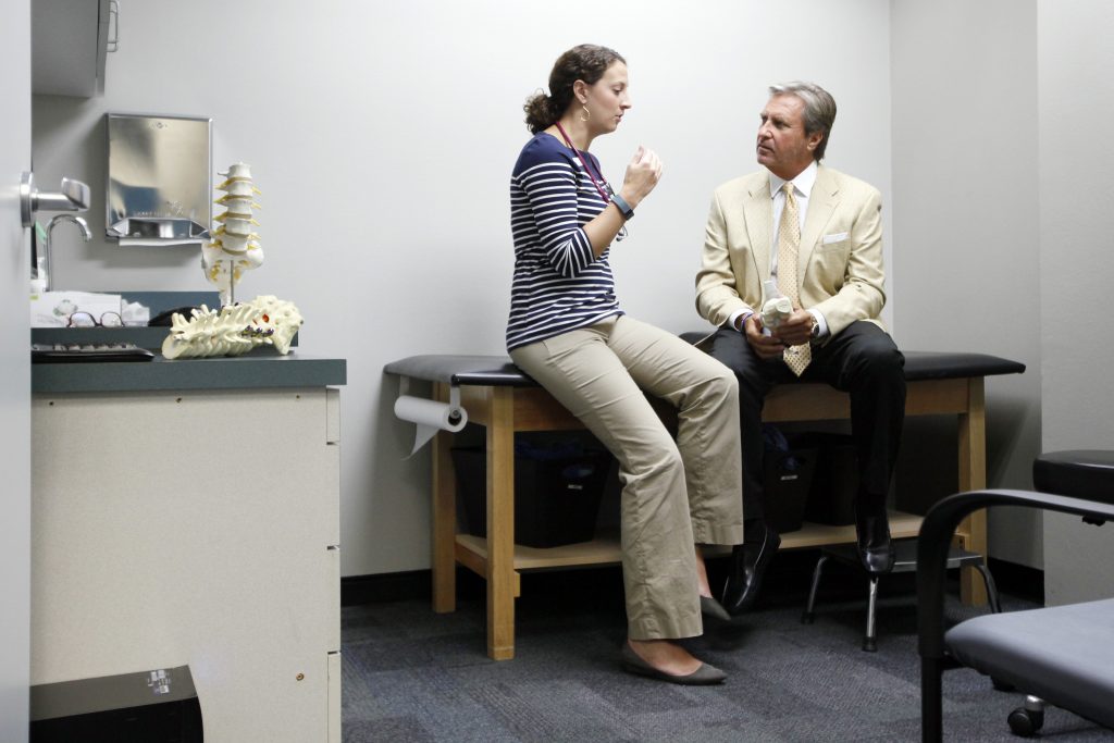 Mohnickey talking with PA Heather Gehnke about the new clinic