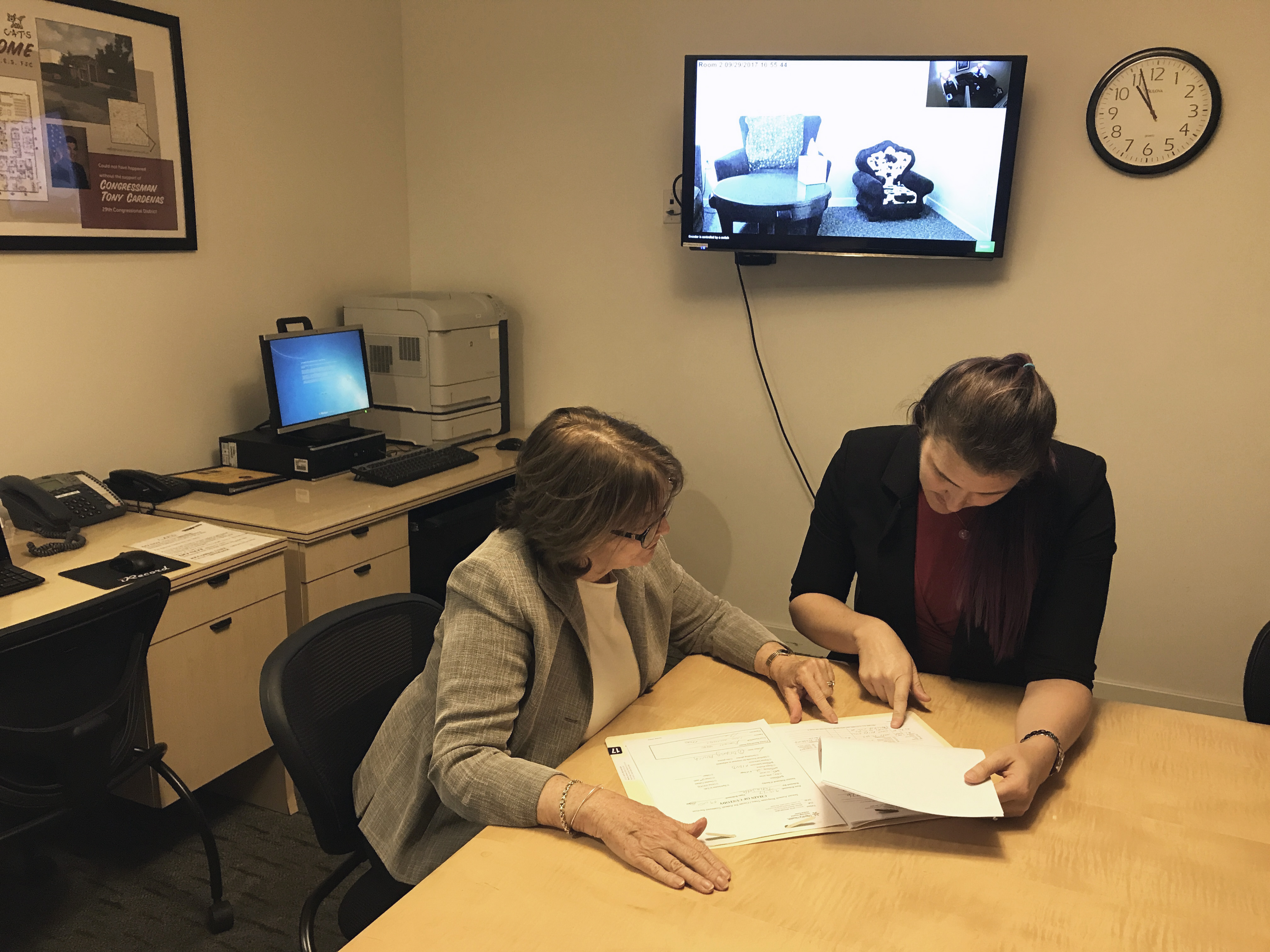Katie Thompson reviewing files