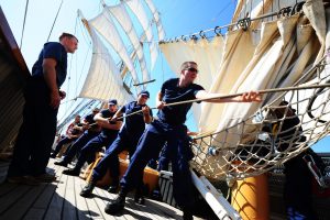 Officer candidates work together during a team-building exercise aboard the U.S. Coast Guard Cutter Eagle
