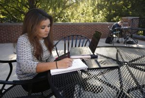 Silvia Garcia studying for her online neuroscience class