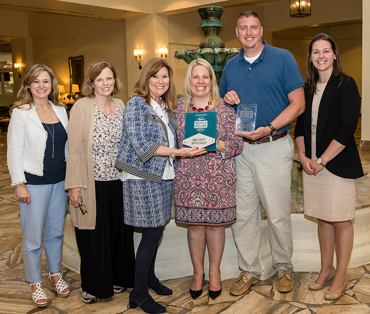 Wake Forest Baptist Health staff with their Employer of Excellence award