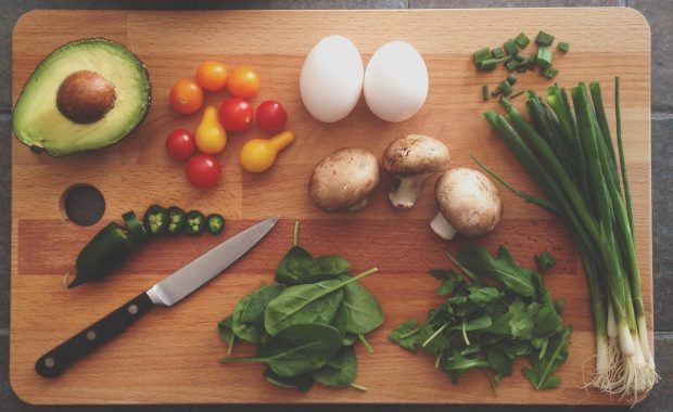 A cutting board filled with different kinds of foods