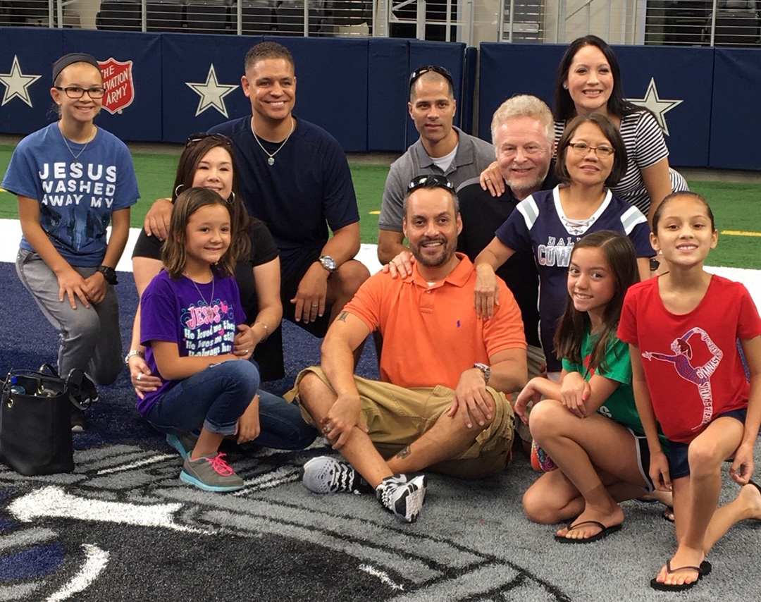 Clark and his family at the Dallas Cowboys' home stadium end zone