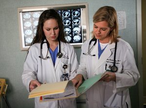 Medical colleagues look at results