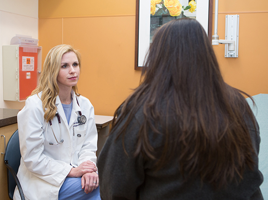 Leah Bayliss meets with patient