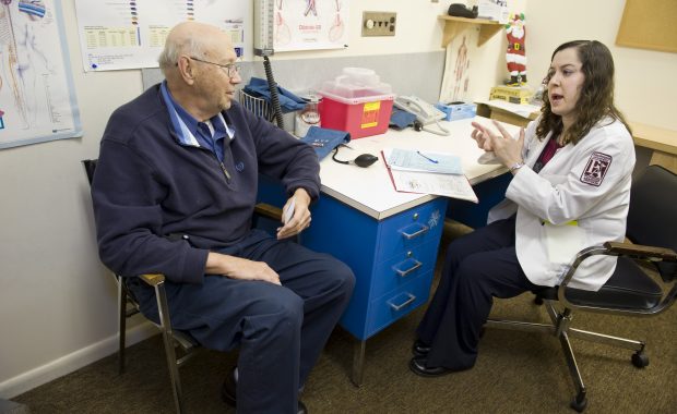 PA talking to her patient