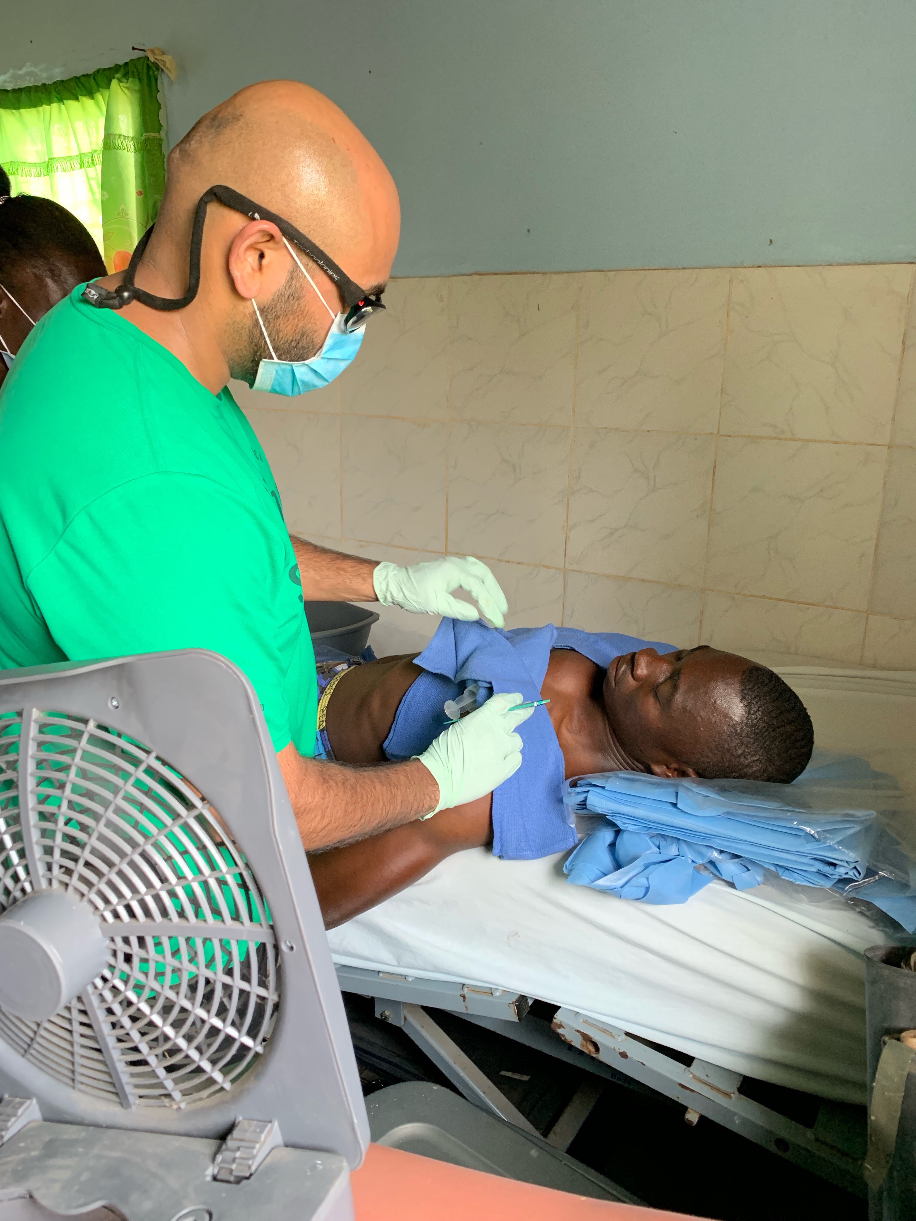 Jacob tending to one of his patients