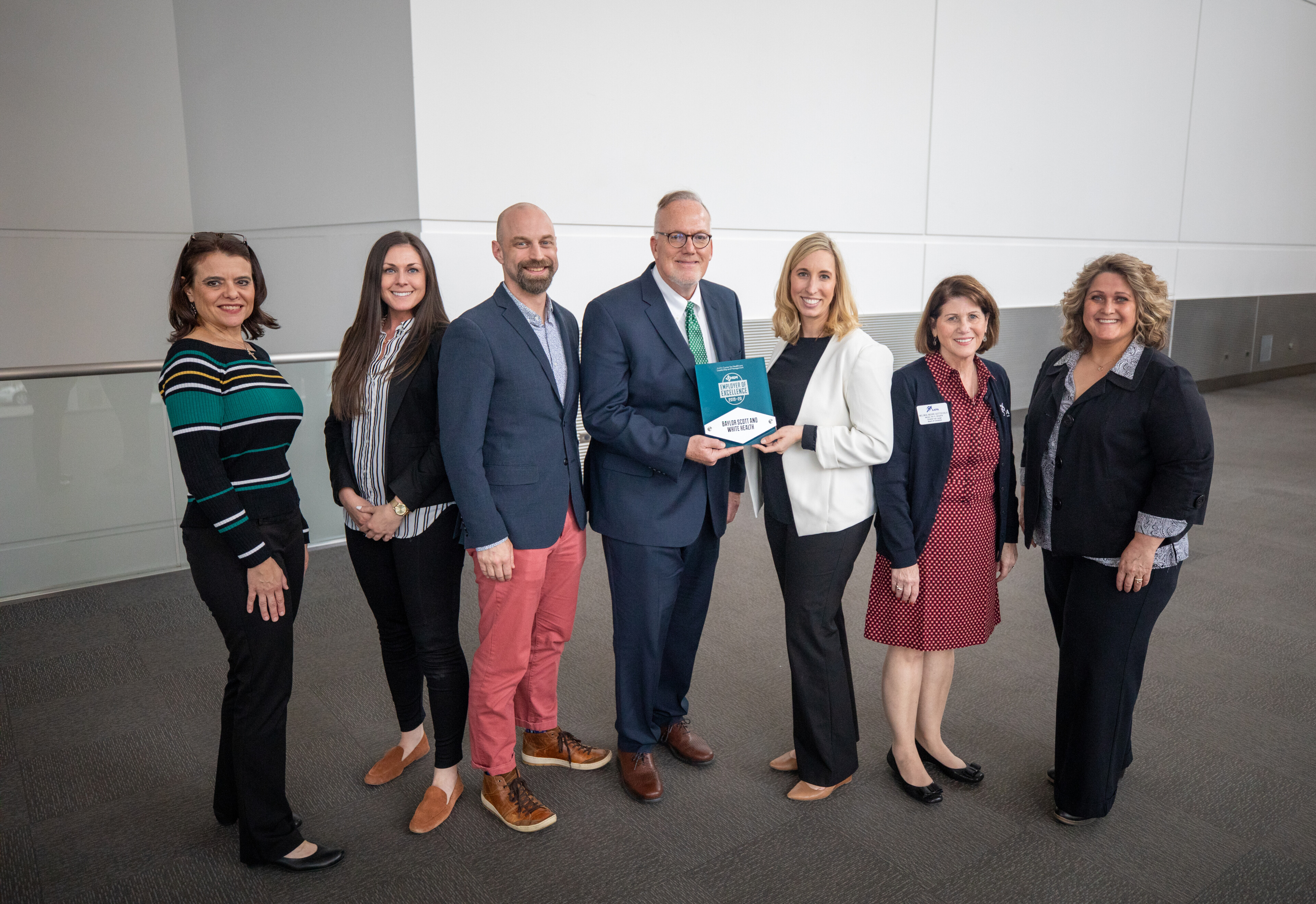Baylor Scott & White Health representatives accepting an Employer of Excellence award at AAPA 2019