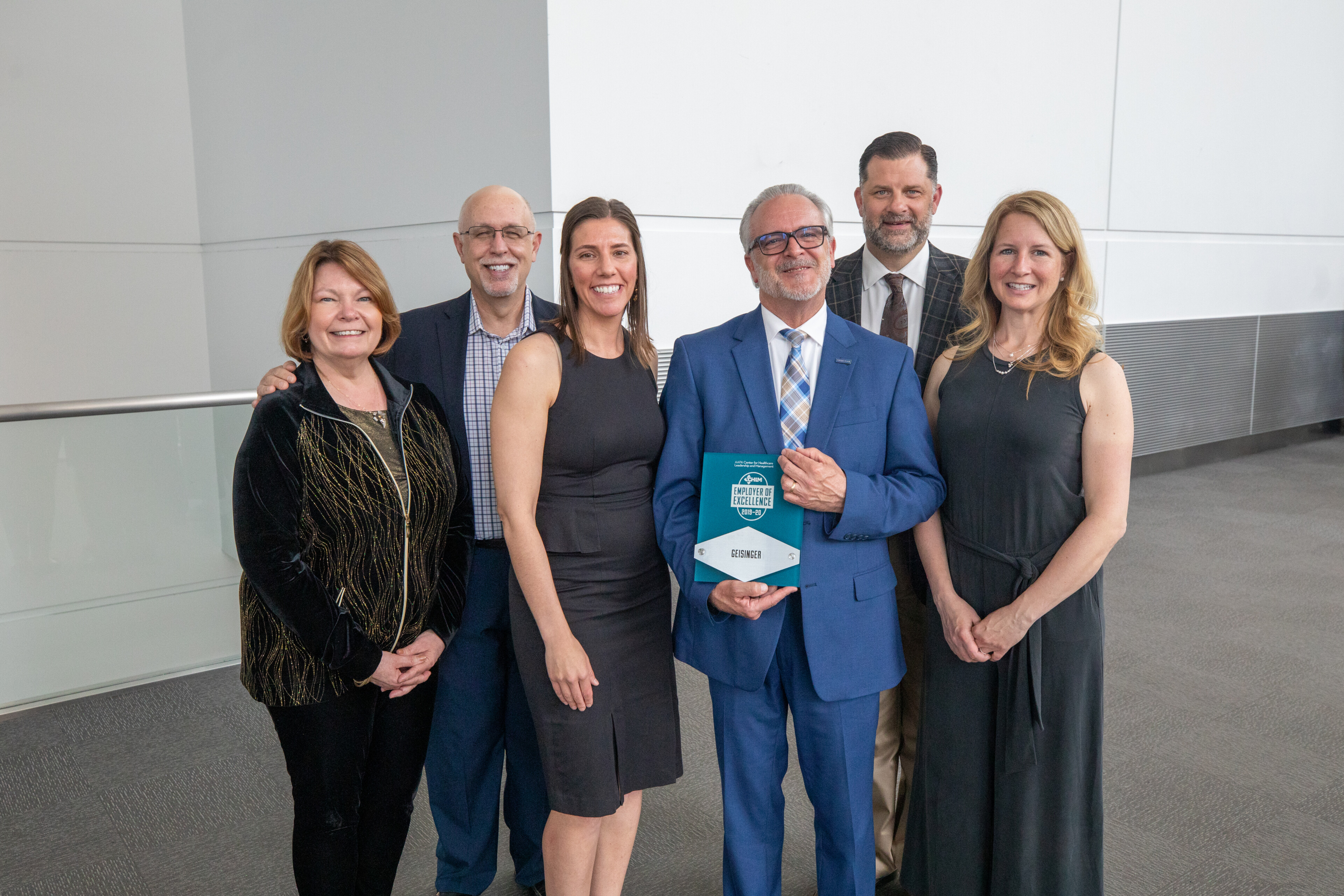 Geisinger representatives accepting an Employer of Excellence award at AAPA 2019