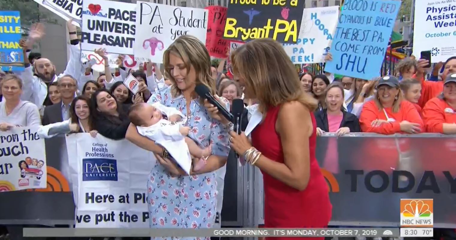 Savannah Guthrie holding Josiah