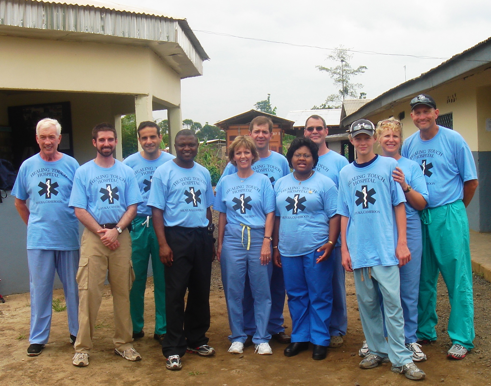 Sixtus Atabong with his fellow providers outside their clinic in Cameroon