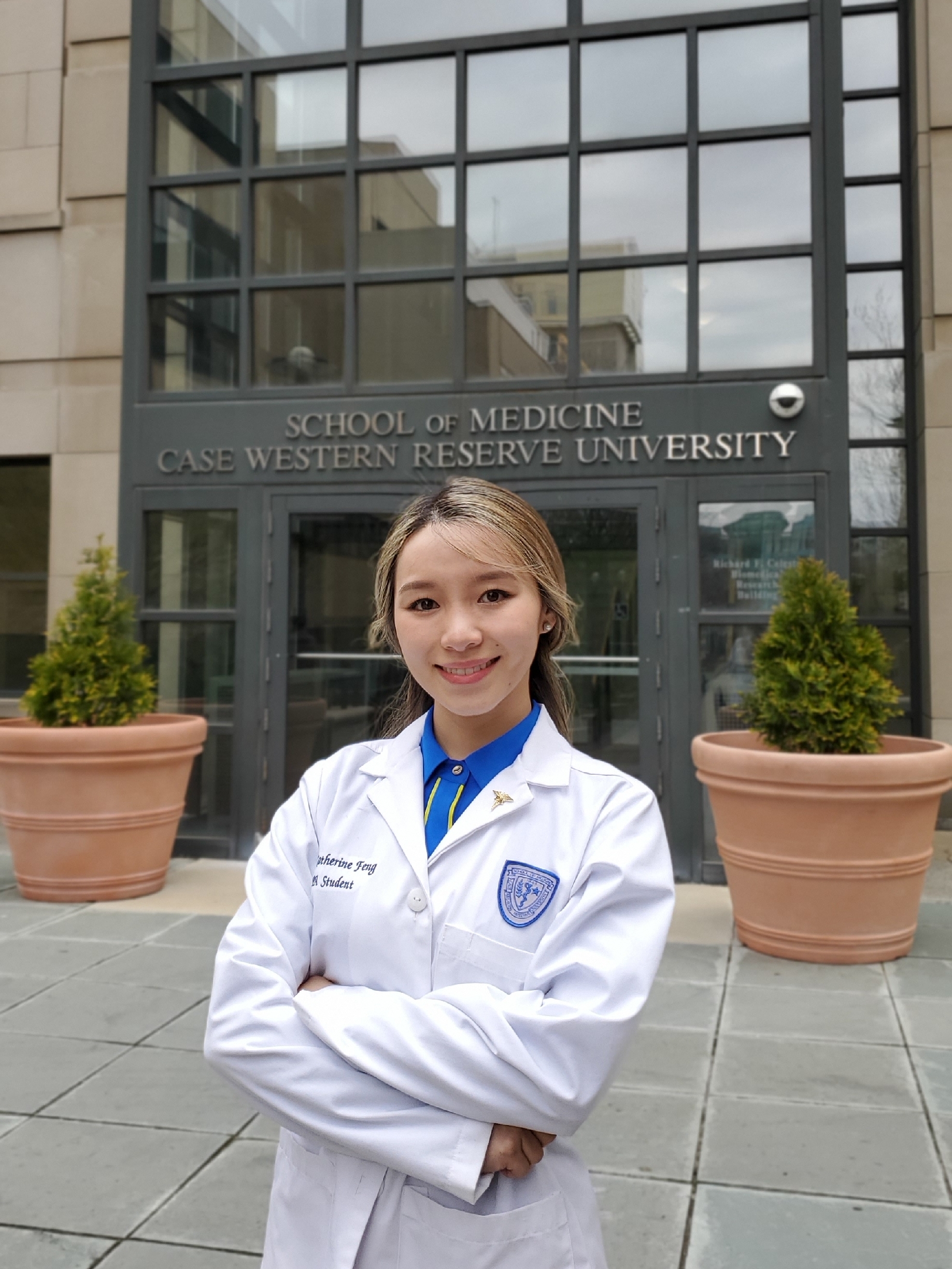 Katherine Feng in front of the School of Medicine