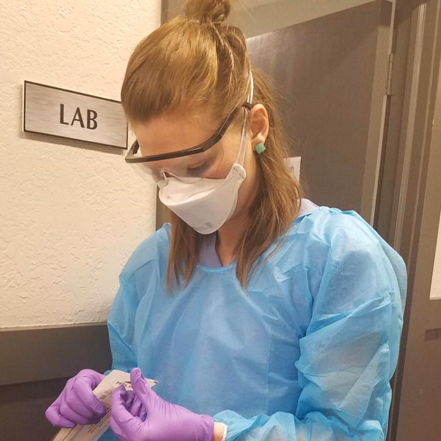 Brittany Arnett wearing PPE