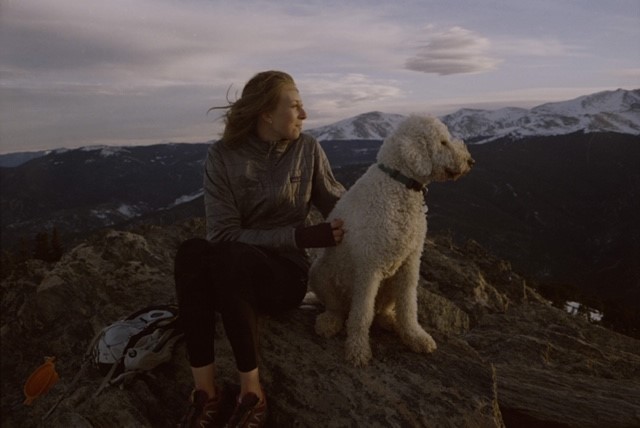 Ganser and her dog Bear at Chief Mountain Summit