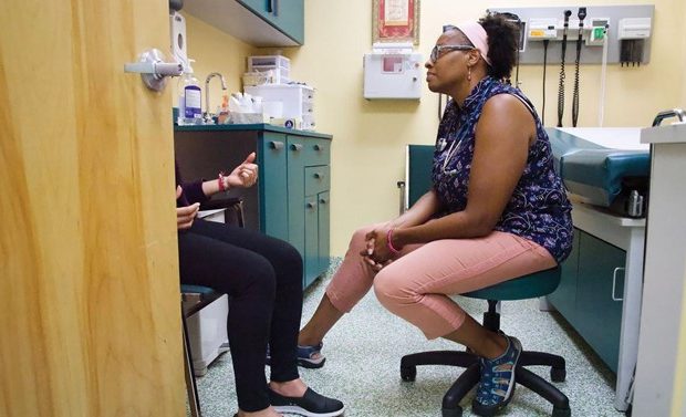 Shantae Rodriguez with a patient