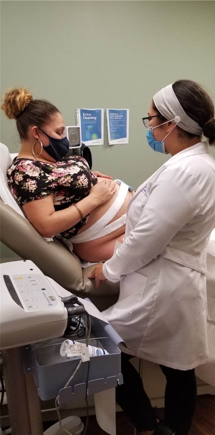 Melissa Rodriguez with a patient