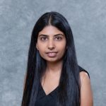 Professional headshot of a young woman