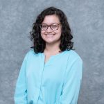 Professional headshot of a young woman